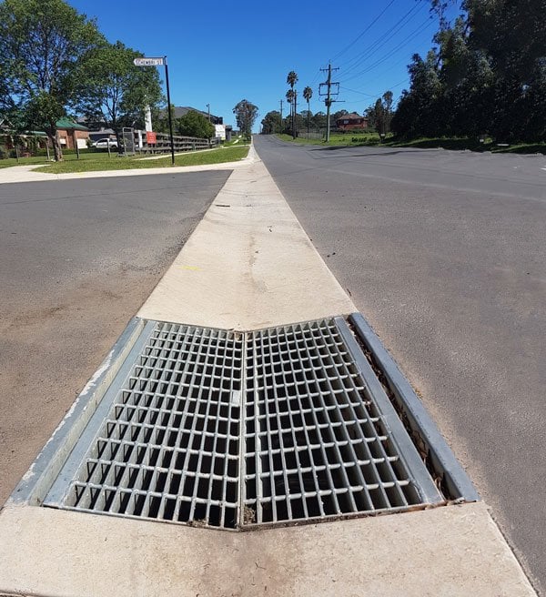 The Holes Are the Feature — Why an Electrical Pit Is a Drainage Decision Before It Is an Access One